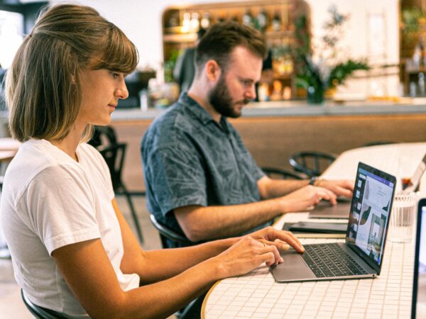 photo of woman using laptop